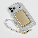 Snow Pearl iPhone Case with a Gold Muse MagSafe Wallet attached