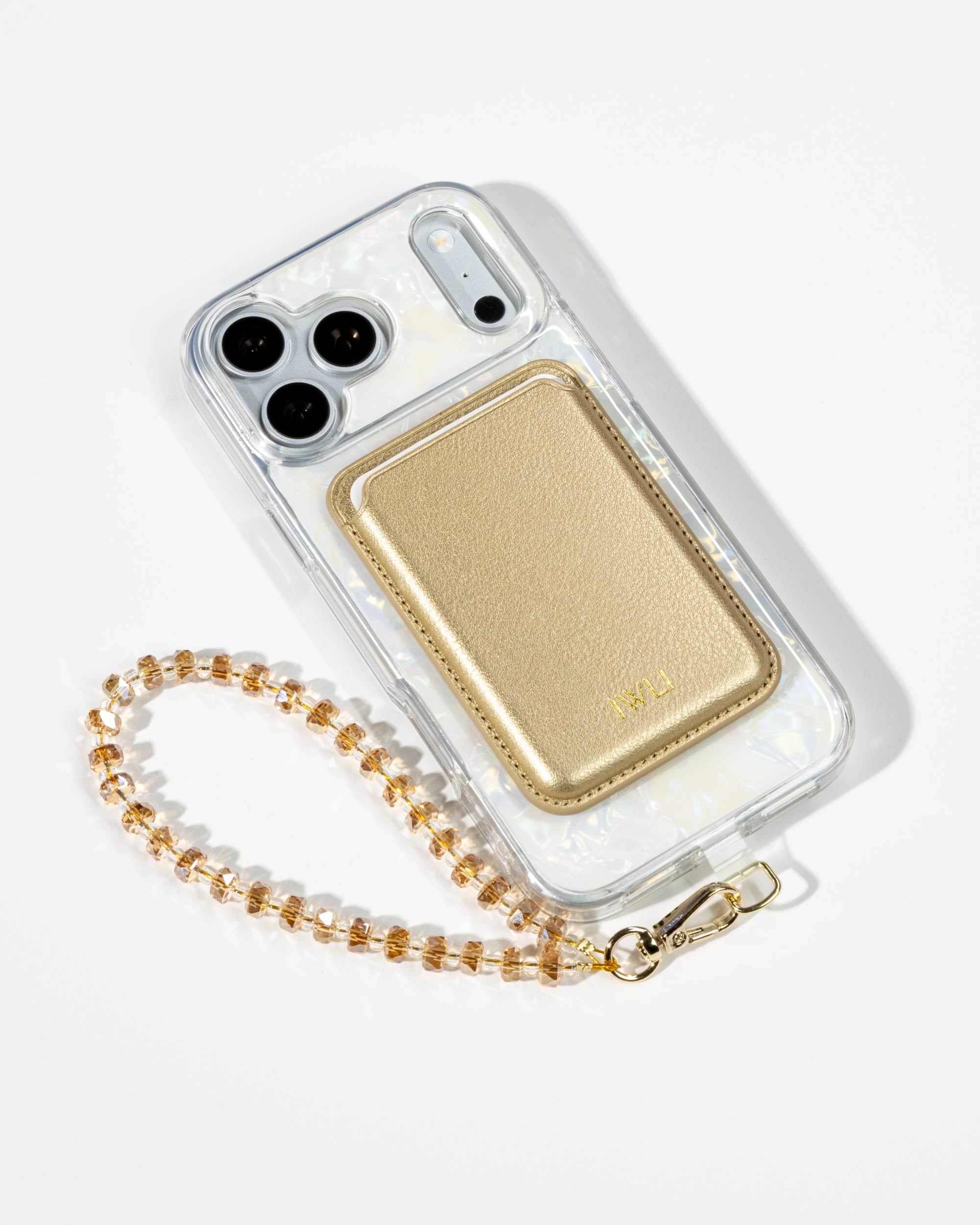 White Shell iPhone Case with a Gold Muse MagSafe Wallet attached