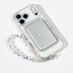 White Shell iPhone Case with a Silver Muse MagSafe Wallet attached