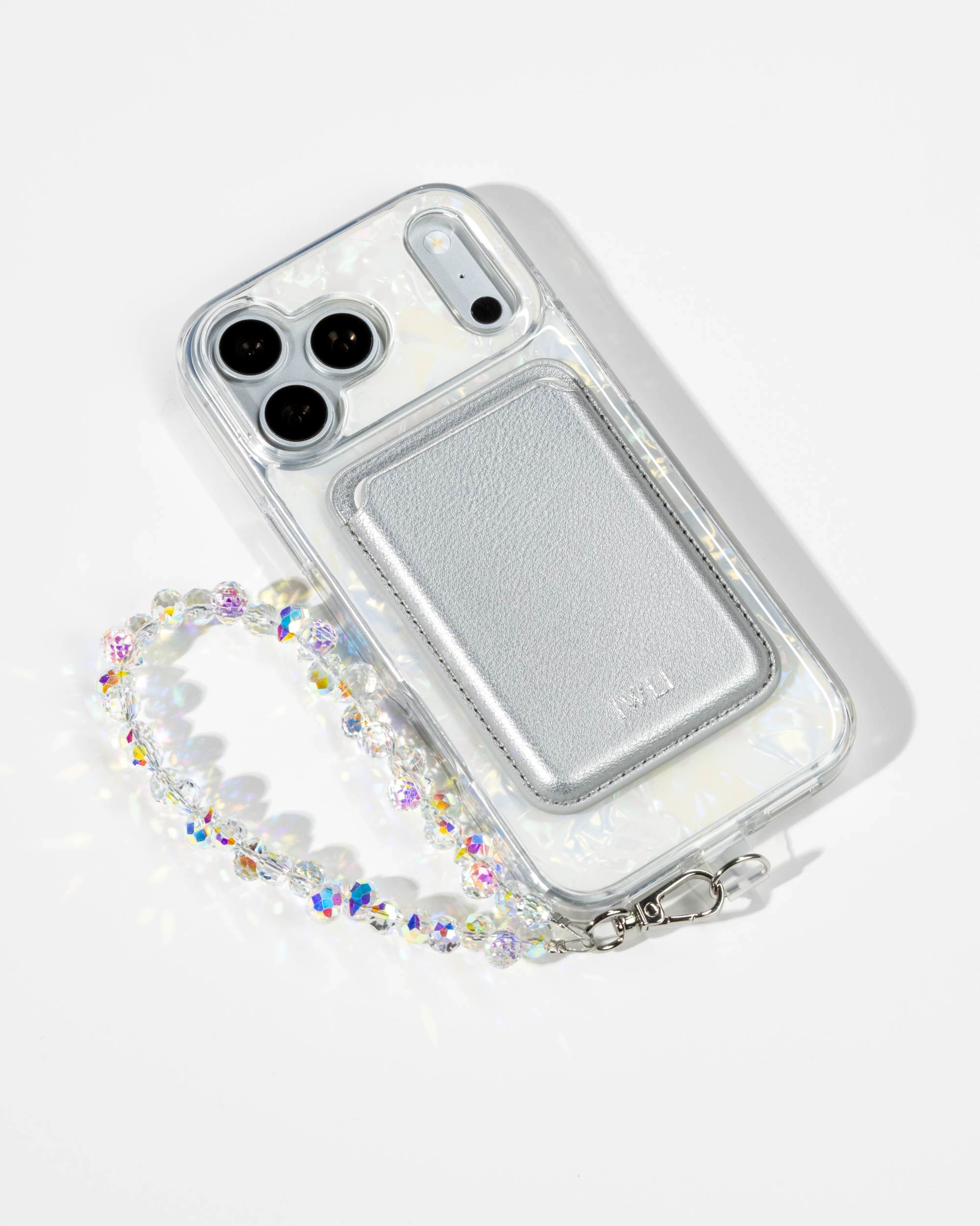 White Shell iPhone Case with a Silver Muse MagSafe Wallet attached