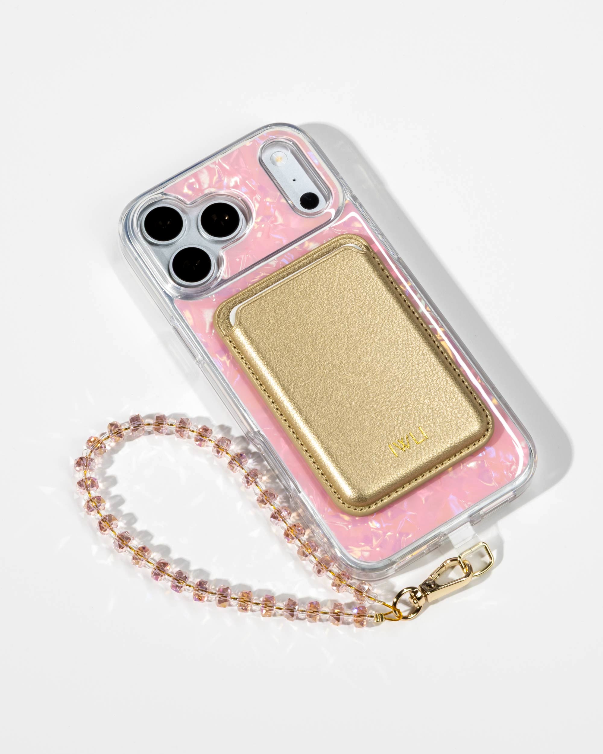 Pink Shell iPhone Case with a Gold Muse MagSafe Wallet attached