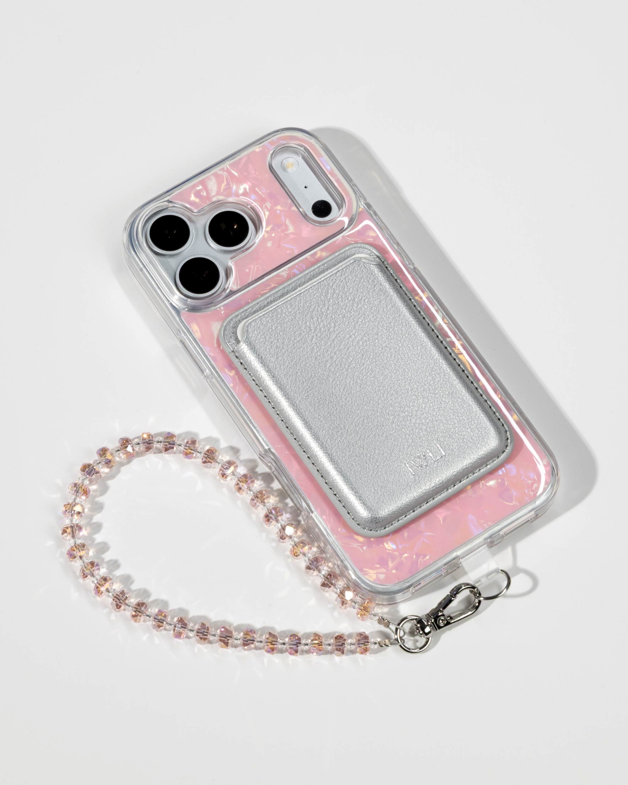 Pink Shell iPhone Case with a Silver Muse MagSafe Wallet attached