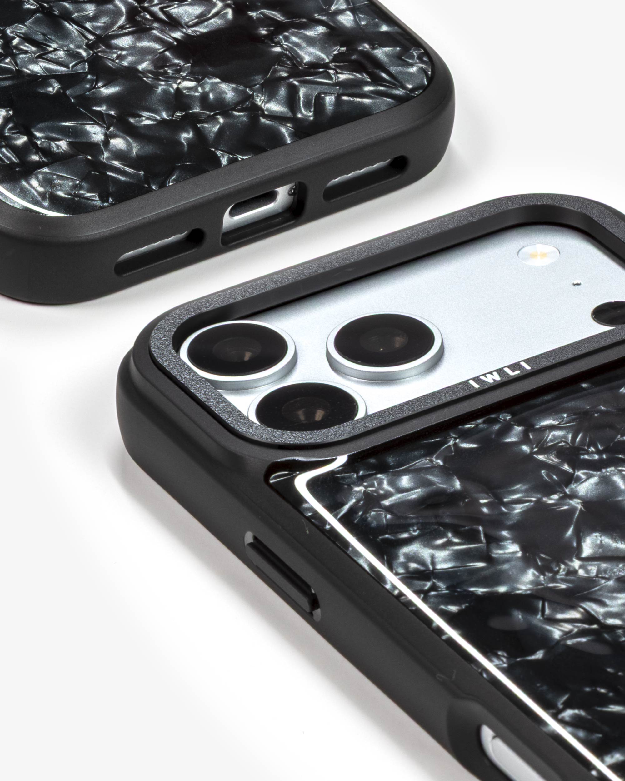 Black Shell iPhone Case, close-up of the camera surround and bottom edge