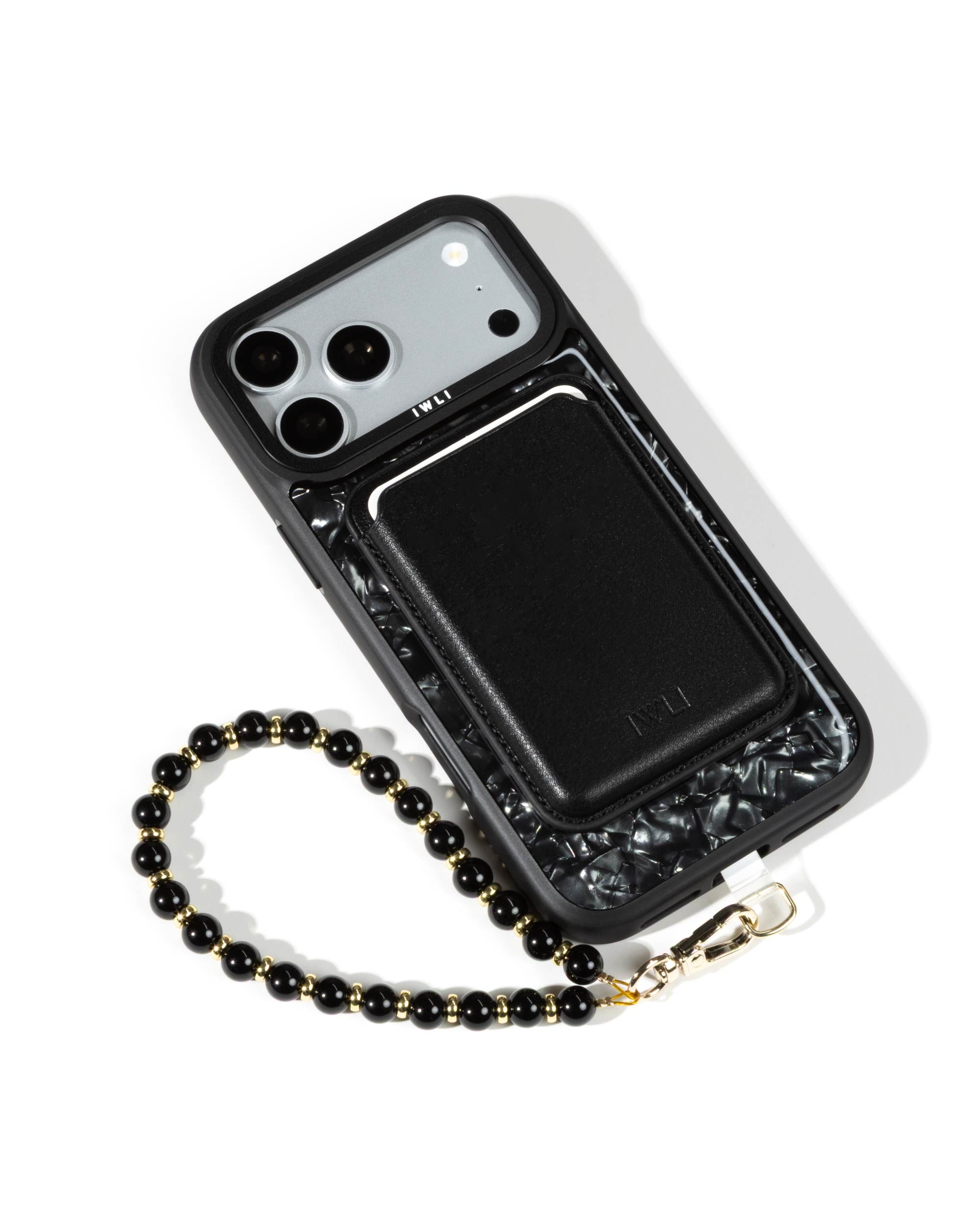 Black Shell iPhone Case with a Black Muse MagSafe Wallet attached
