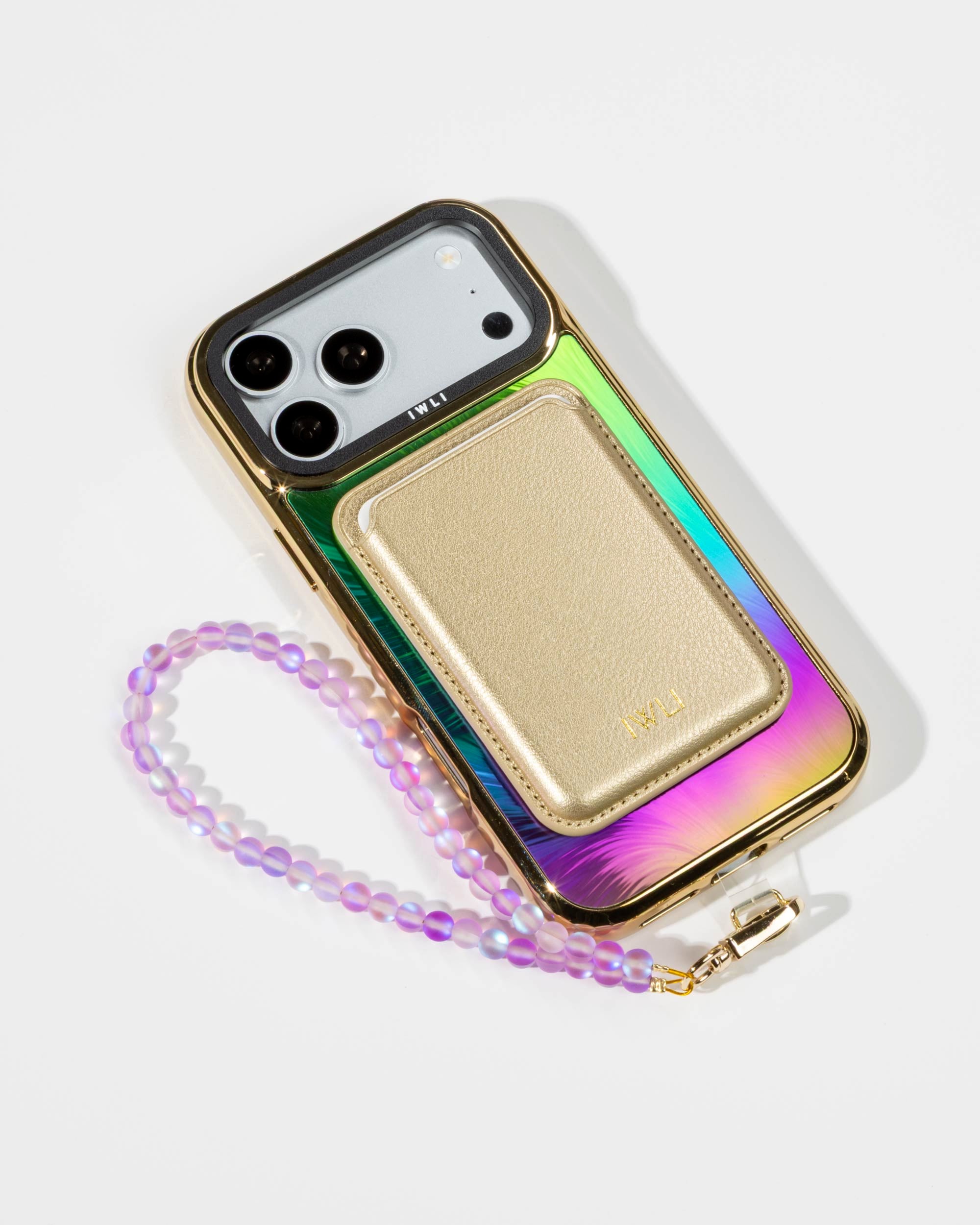 Peacock Feather Holo iPhone Case with a Gold Muse MagSafe Wallet attached