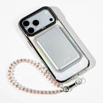 Pastel Petal Holo iPhone Case with a Silver Muse MagSafe Wallet attached