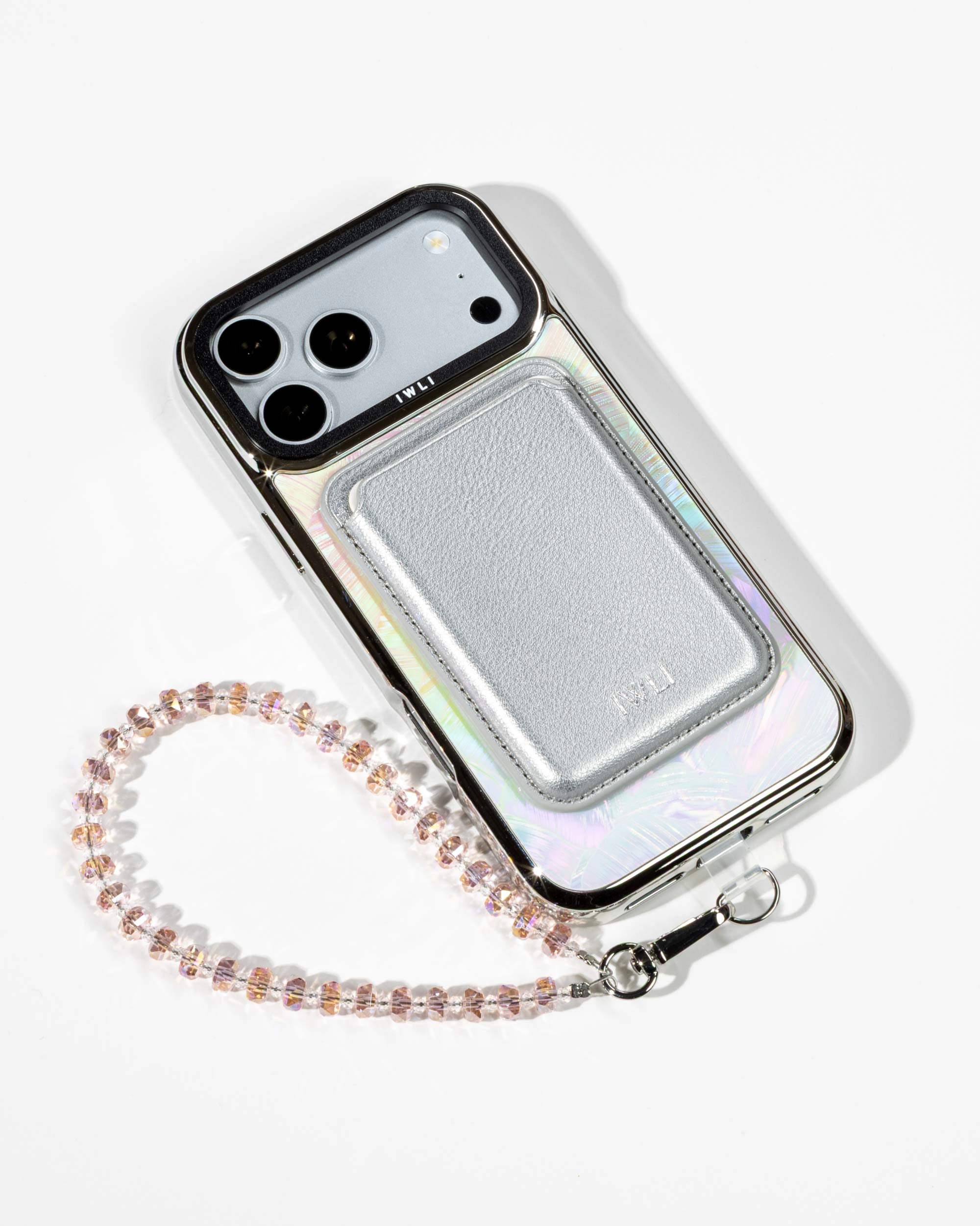 Pastel Petal Holo iPhone Case with a Silver Muse MagSafe Wallet attached