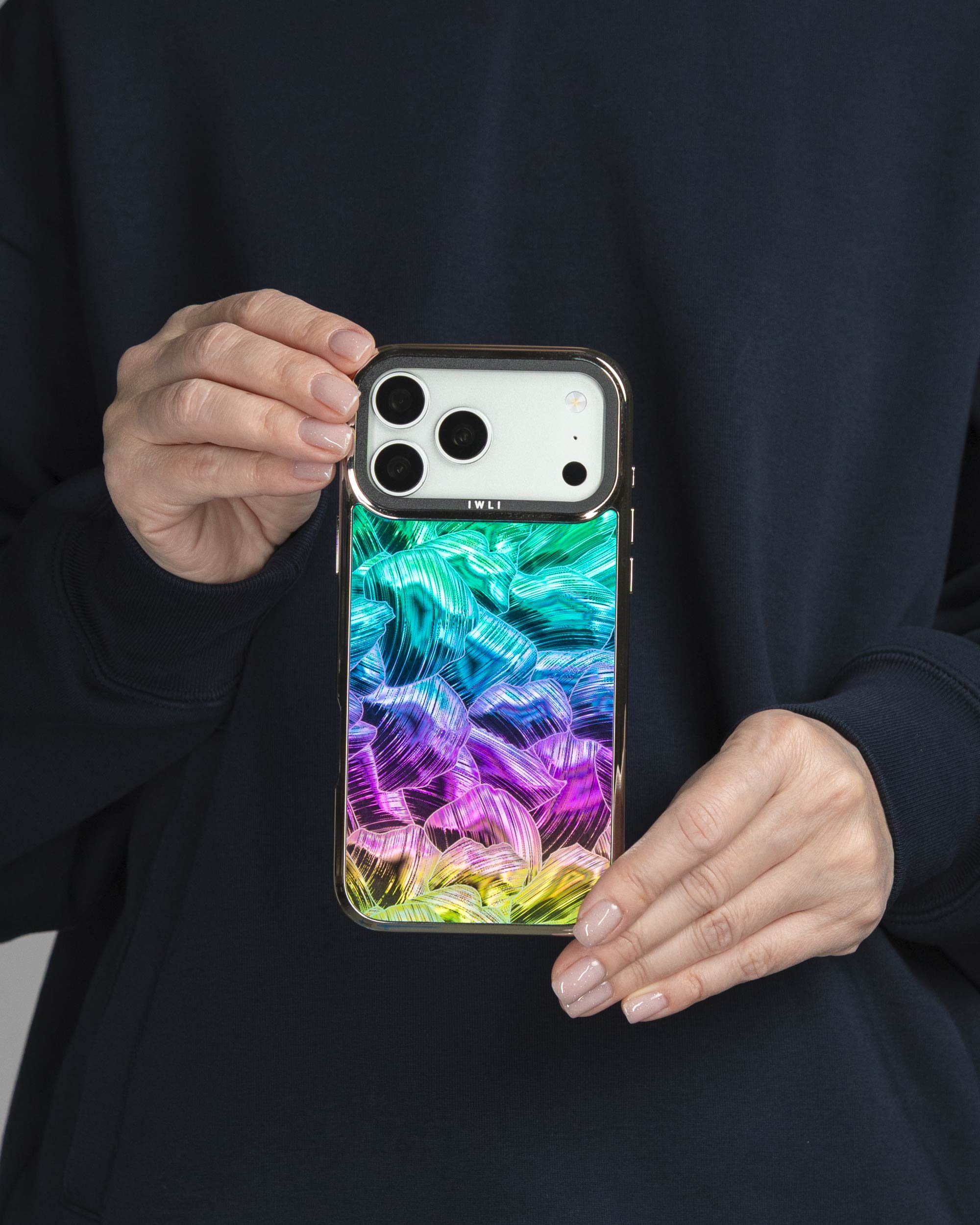 Mermaid Scale Holo iPhone Case held in both hands, iPhone 17 Pro Max