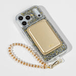 Starlight Sparkle iPhone Case with a Gold Muse MagSafe Wallet attached