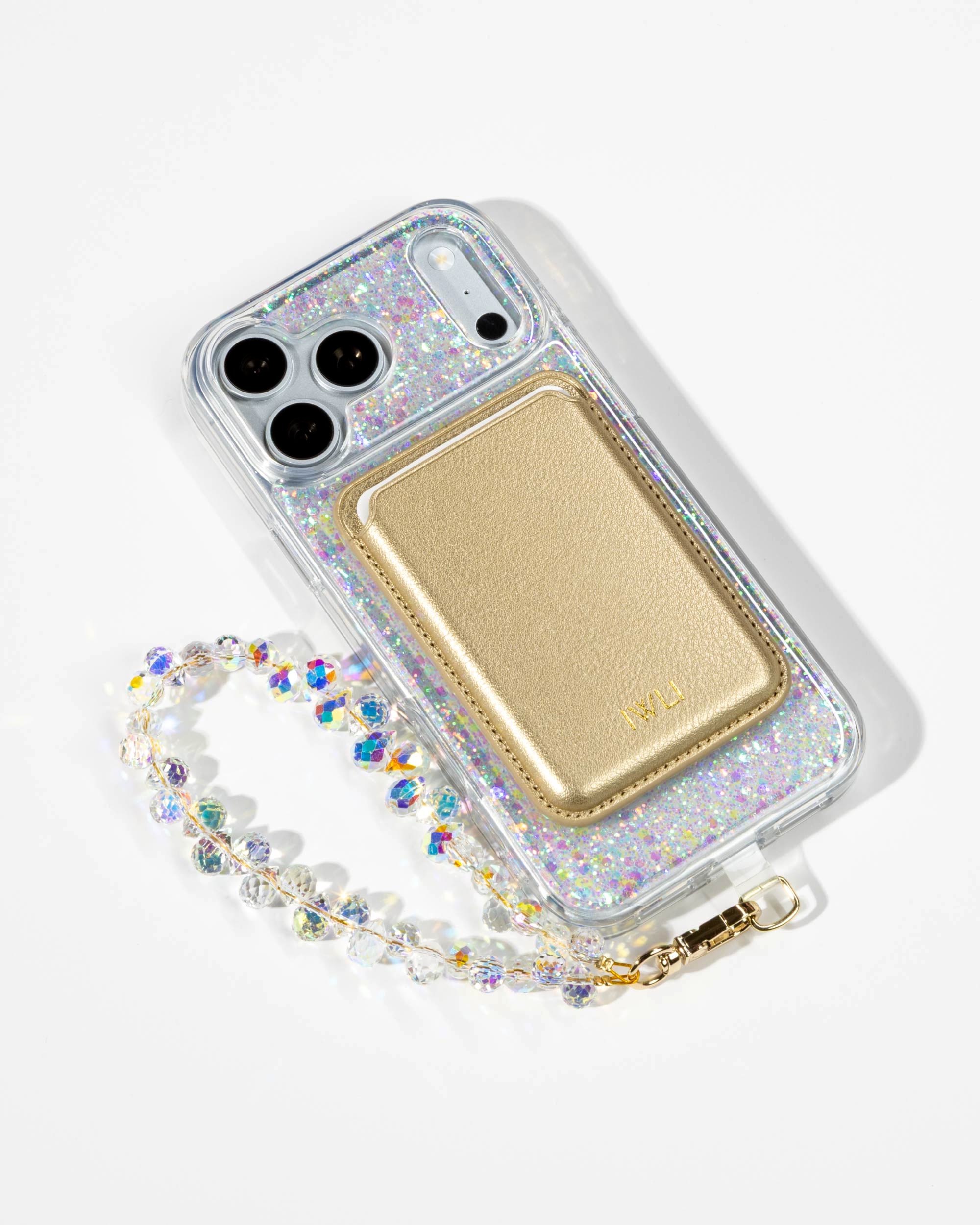 Opal Sparkle iPhone Case with a Gold Muse MagSafe Wallet attached