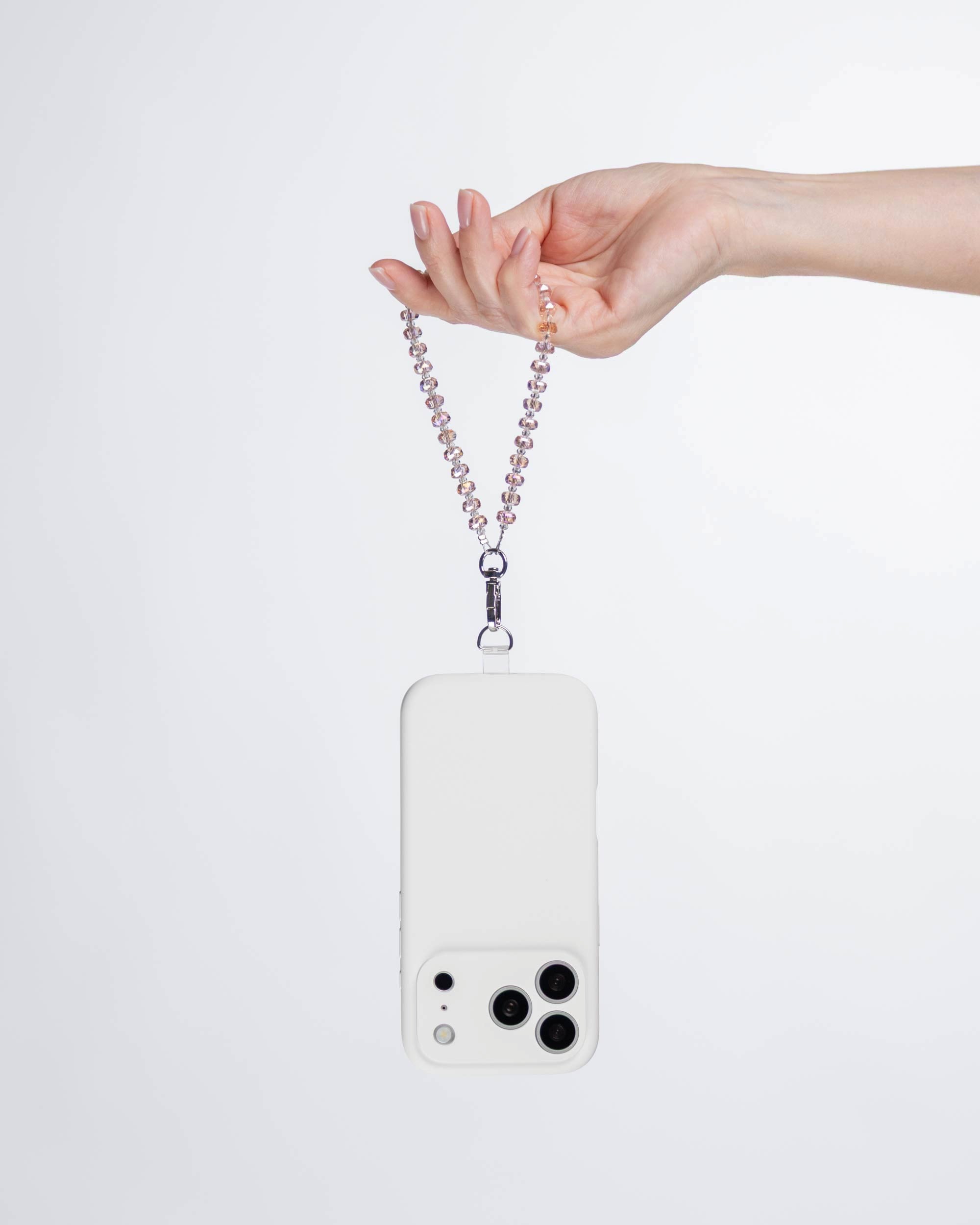 Blush Prism Glow Phone Charm — Silver-Tone shown on hand, glass phone charm by IWLI