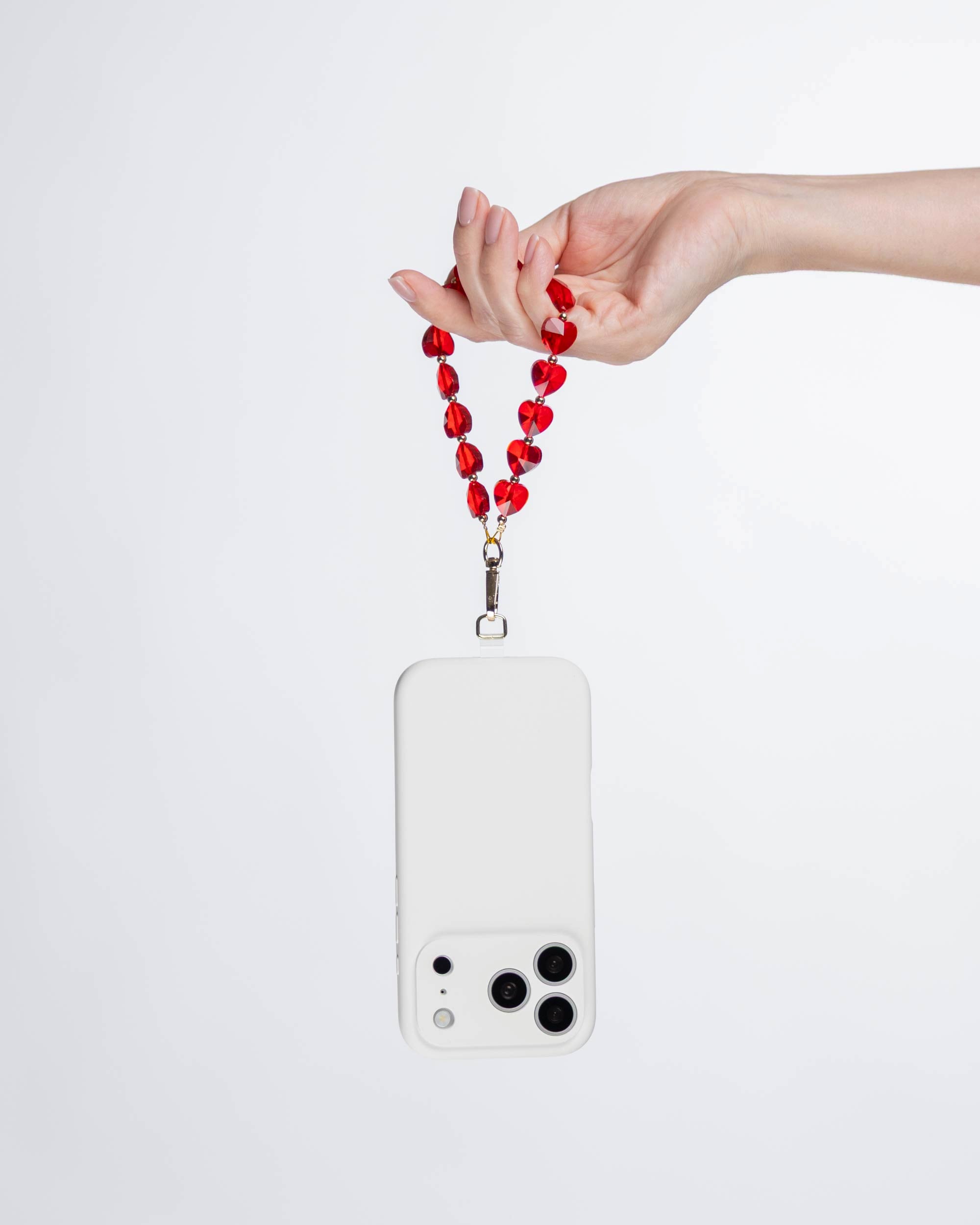 True Red Heart Phone Charm shown on hand, glass phone charm by IWLI