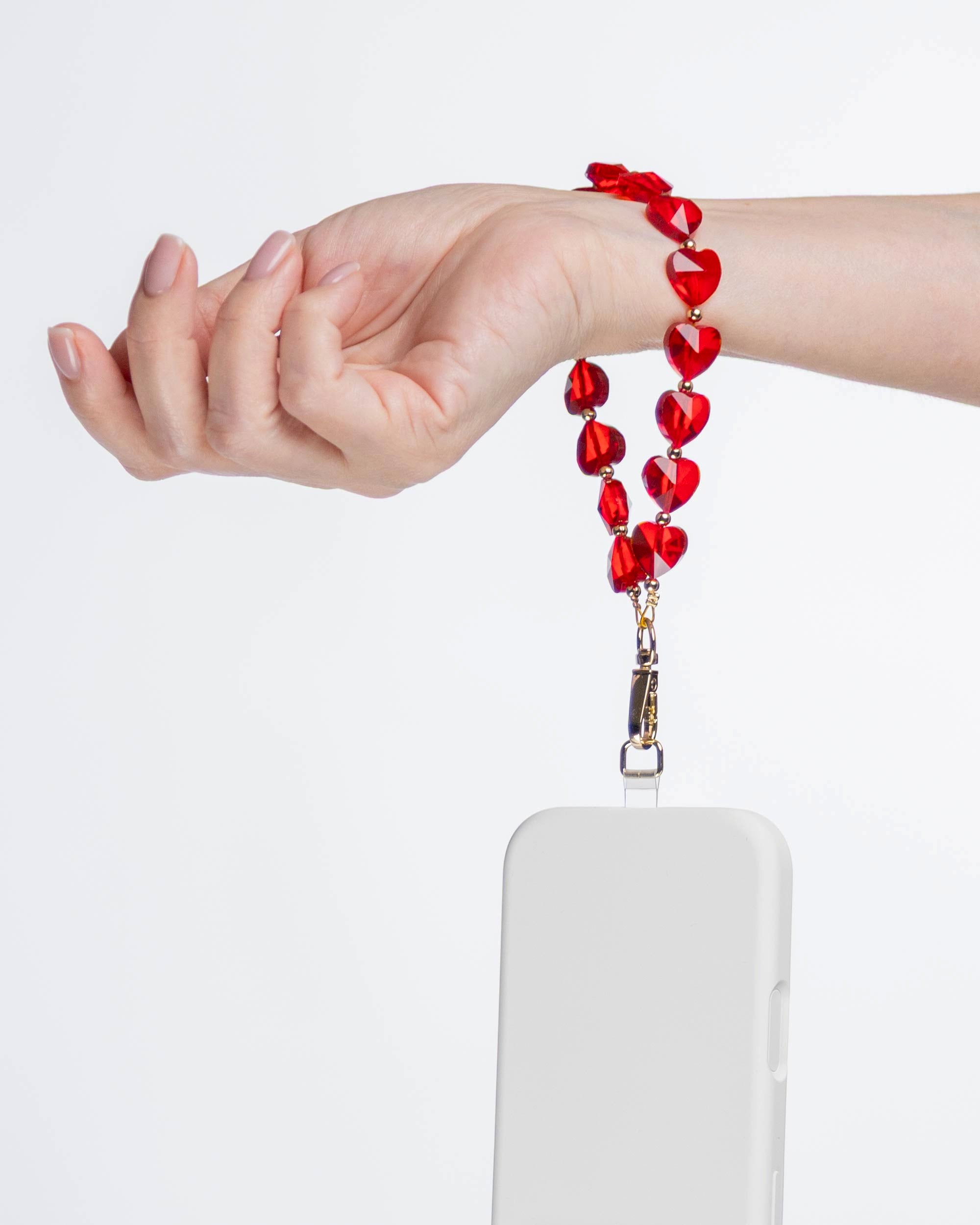 True Red Heart Phone Charm hanging from hand, glass phone charm by IWLI