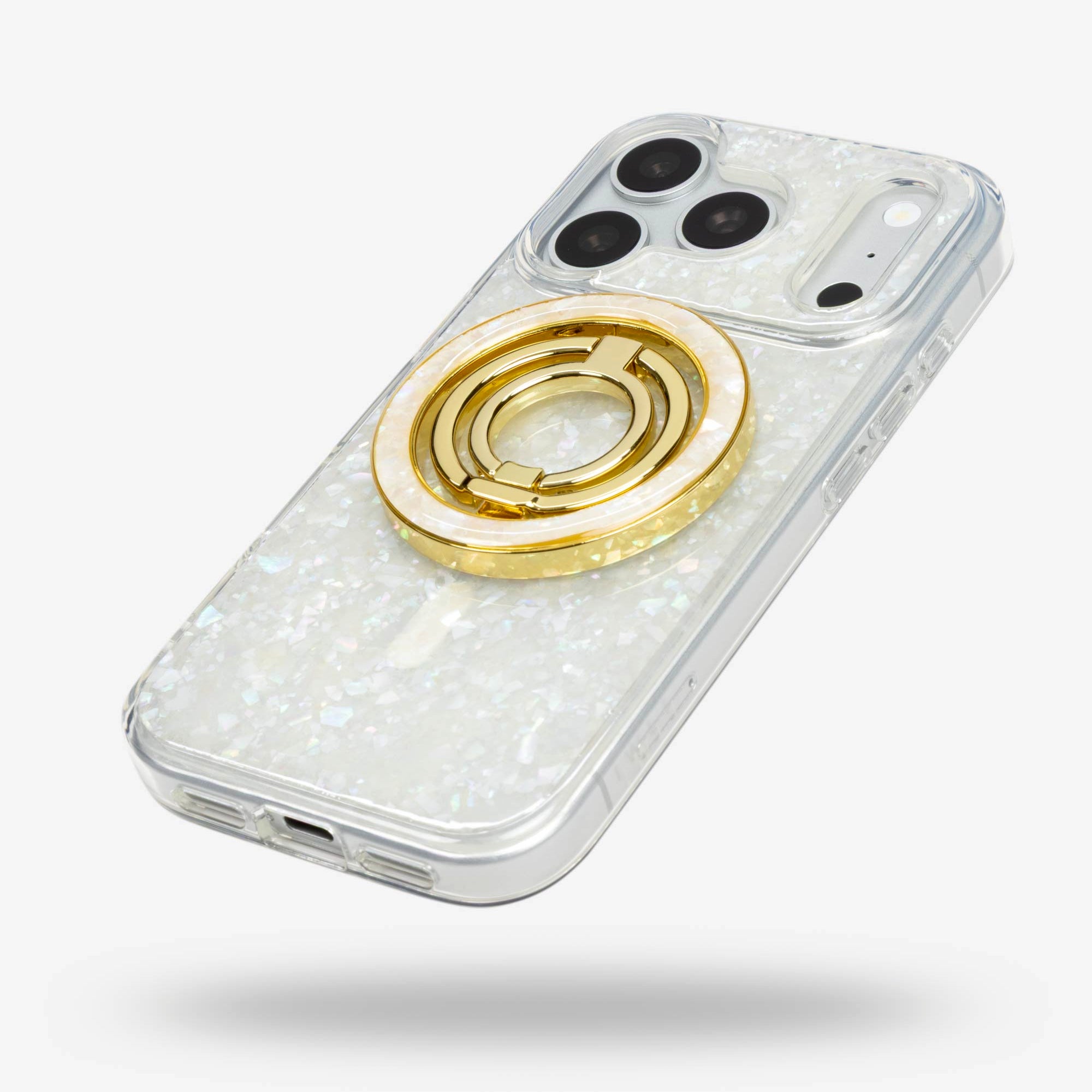 Snow Pearl Ring Stand, gold-tone, folded flat on the back of an iPhone case