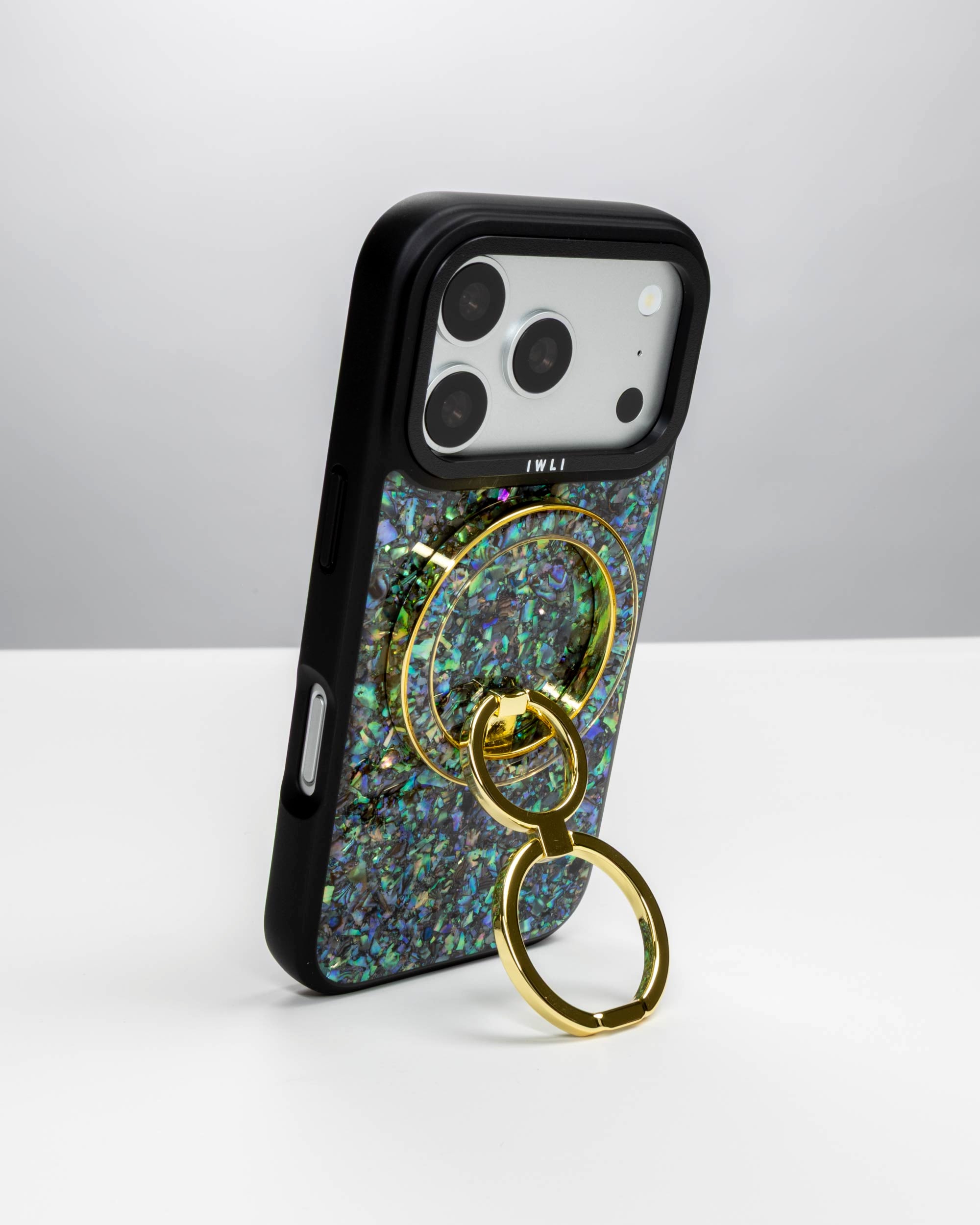 Abalone Pearl Ring Stand, gold-tone, holding an iPhone upright as a stand