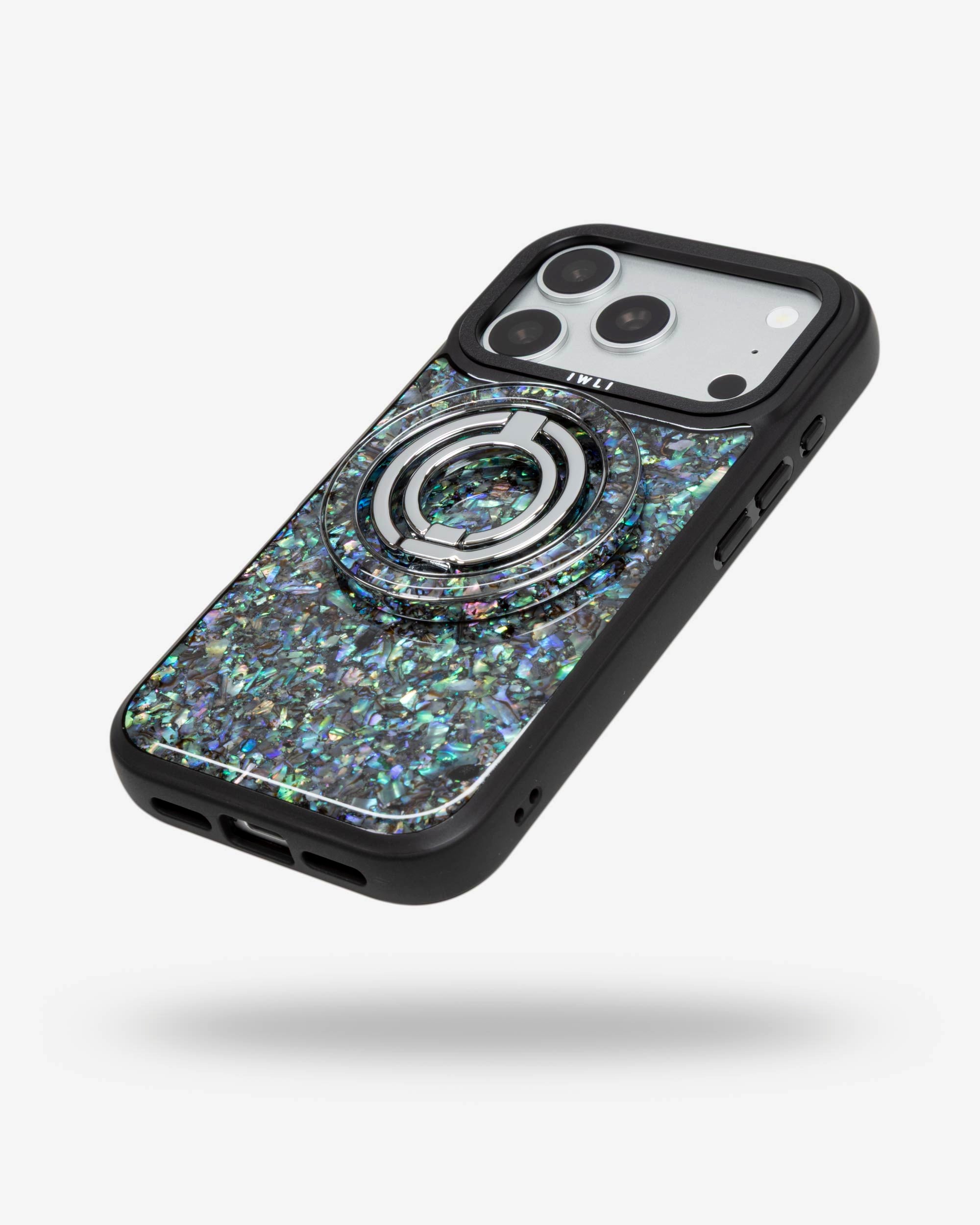 Abalone Pearl Ring Stand, silver-tone, folded flat on the back of an iPhone case