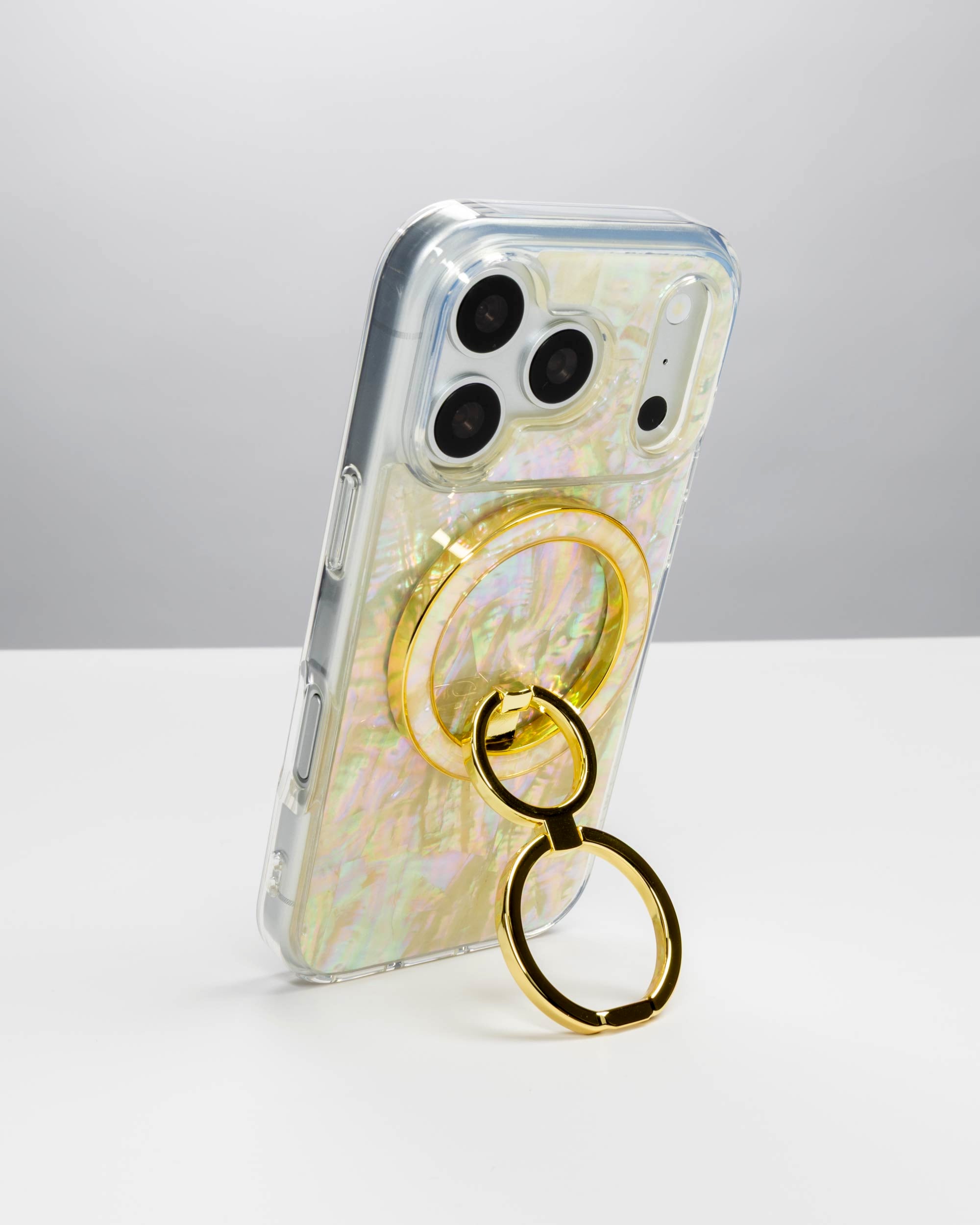 Opal Pearl Ring Stand, gold-tone, holding an iPhone upright as a stand