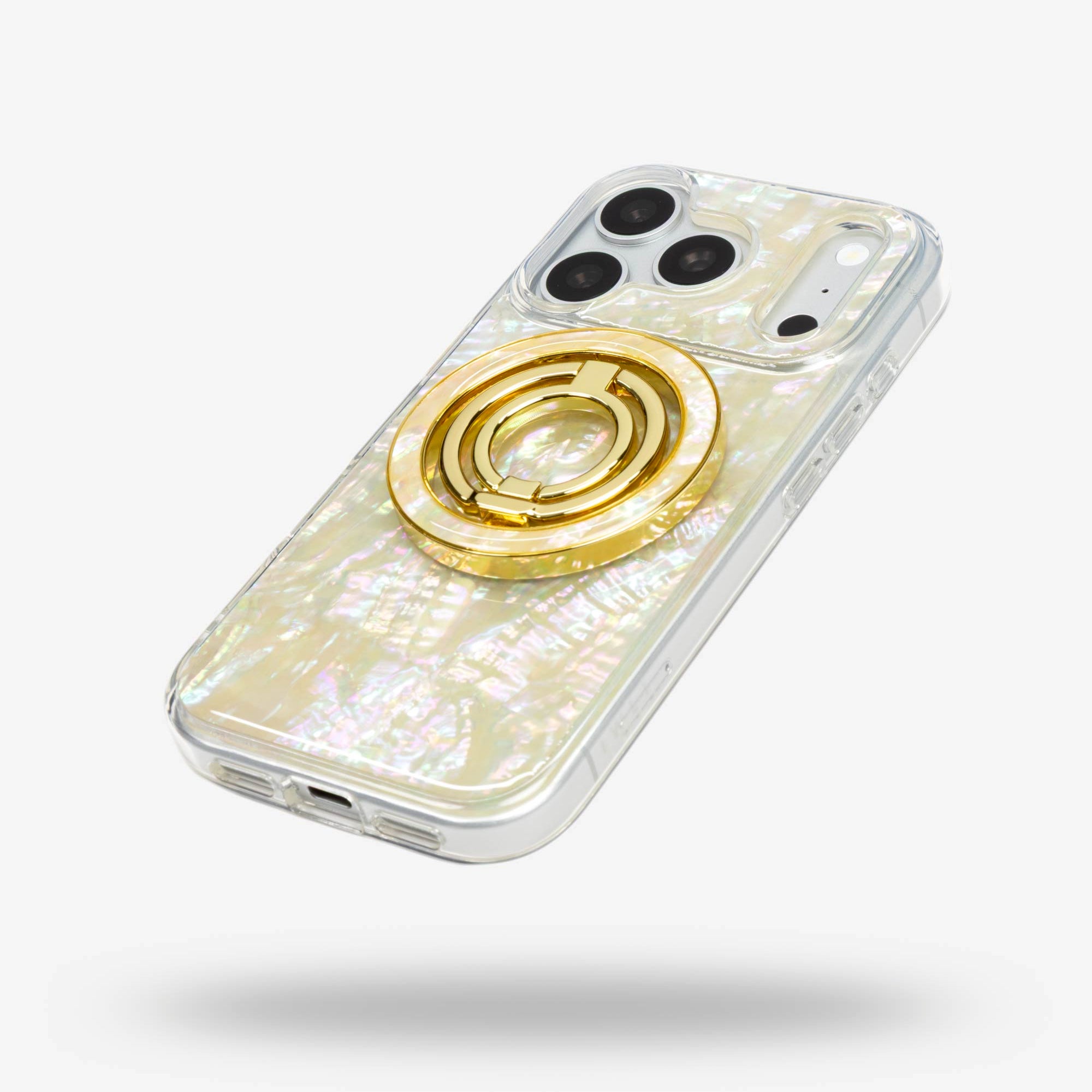 Opal Pearl Ring Stand, gold-tone, folded flat on the back of an iPhone case