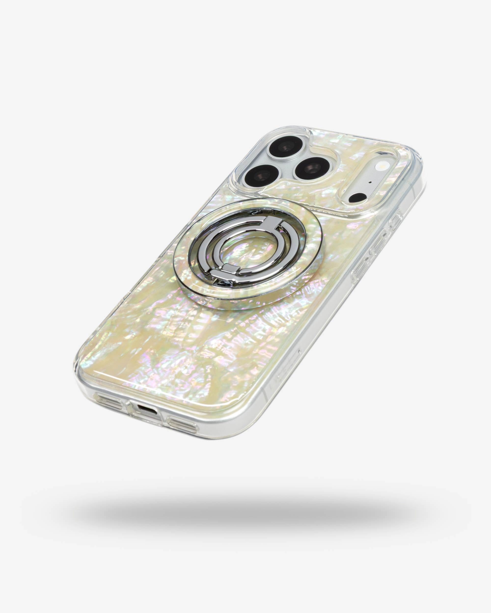 Opal Pearl Ring Stand, silver-tone, folded flat on the back of an iPhone case