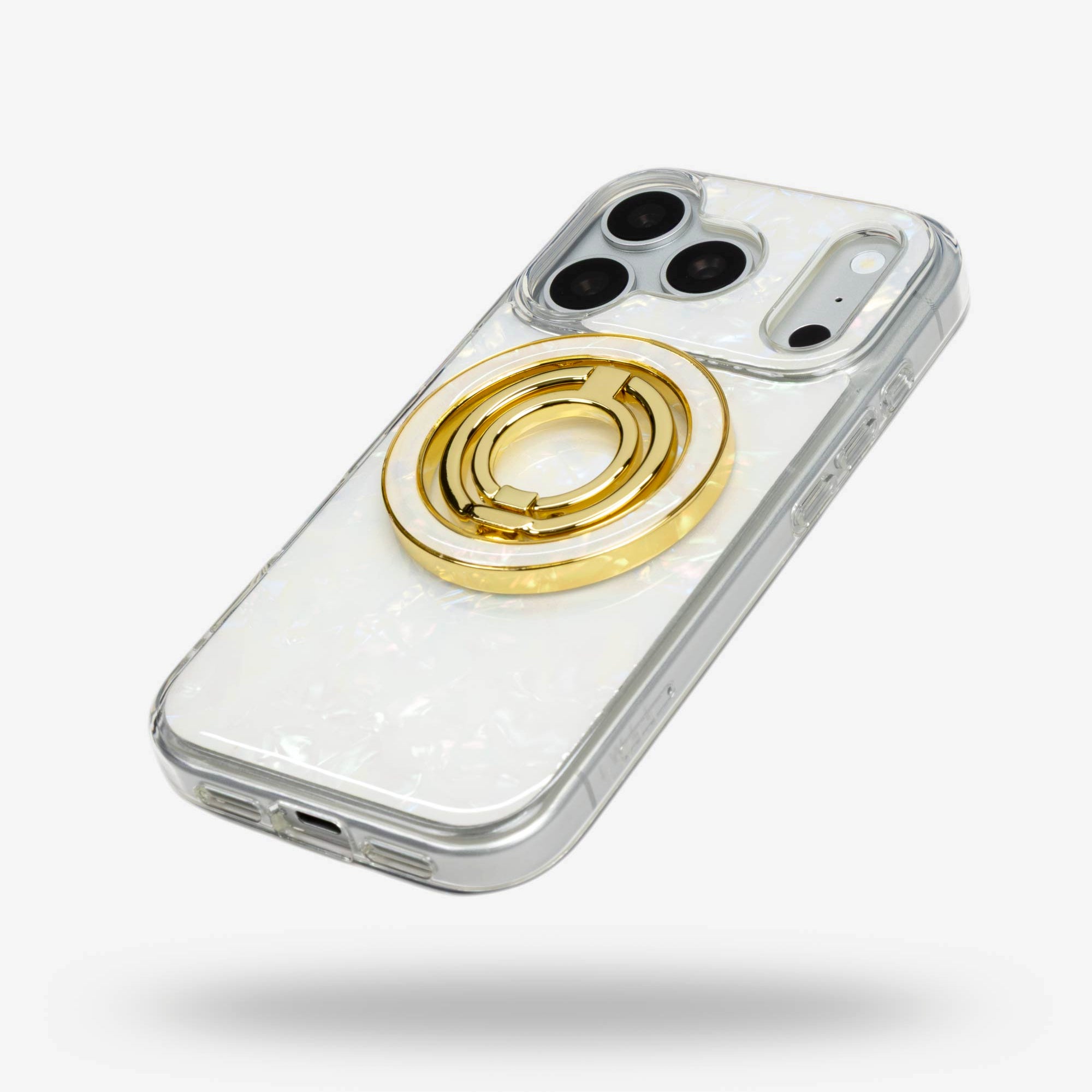 White Shell Ring Stand, gold-tone, folded flat on the back of an iPhone case