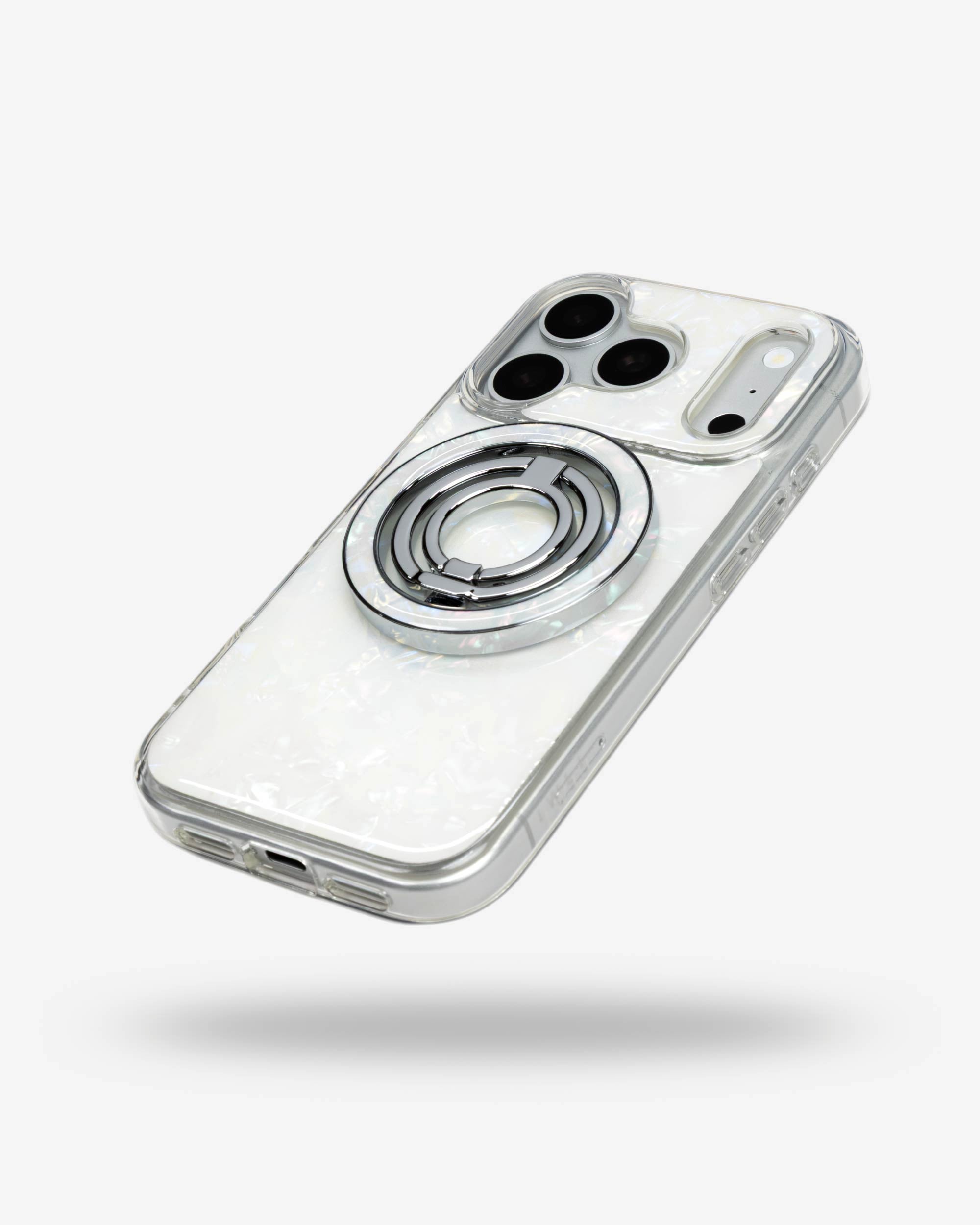 White Shell Ring Stand, silver-tone, folded flat on the back of an iPhone case