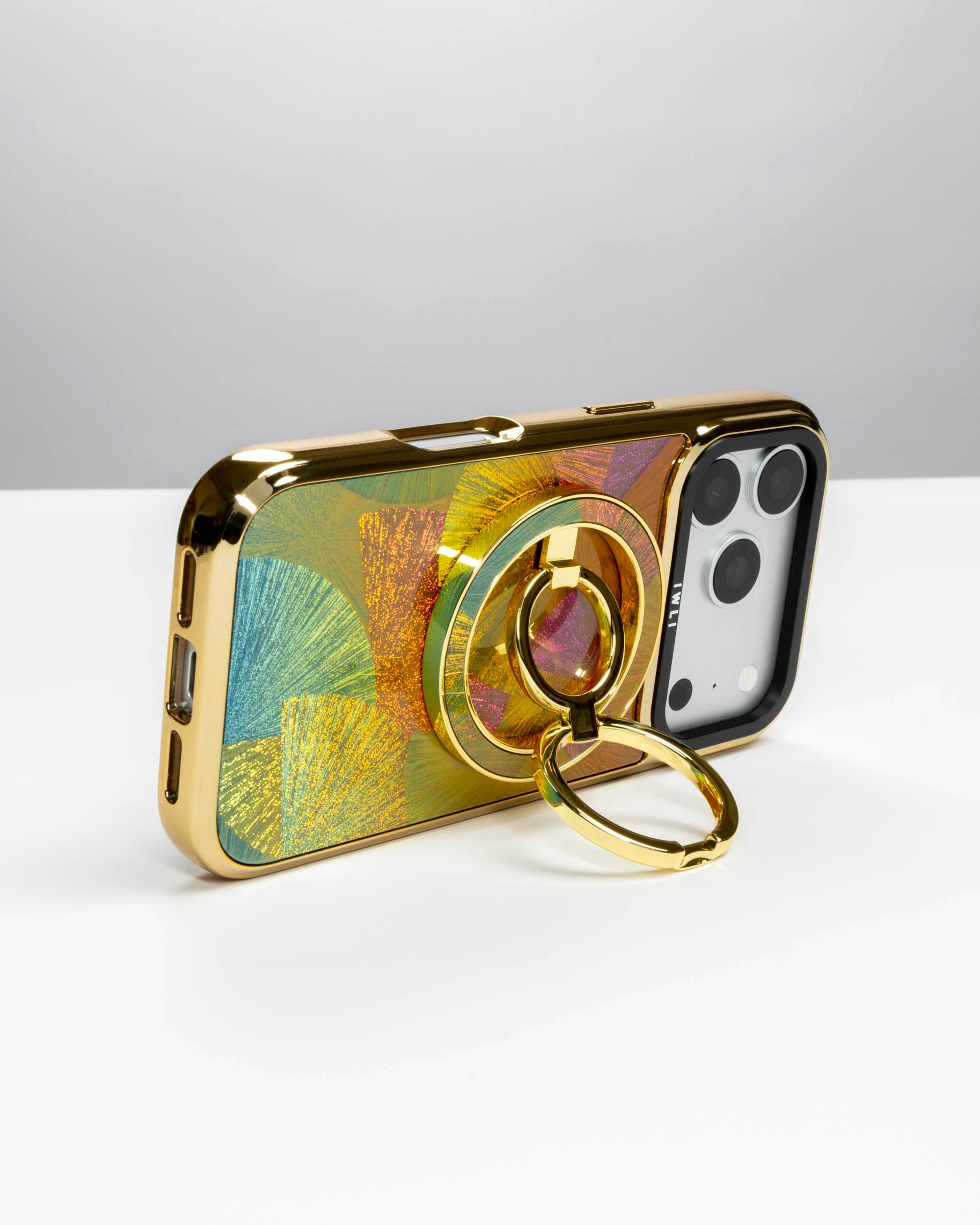 Sunset Fan Holo Ring Stand, gold-tone, holding an iPhone in landscape as a stand