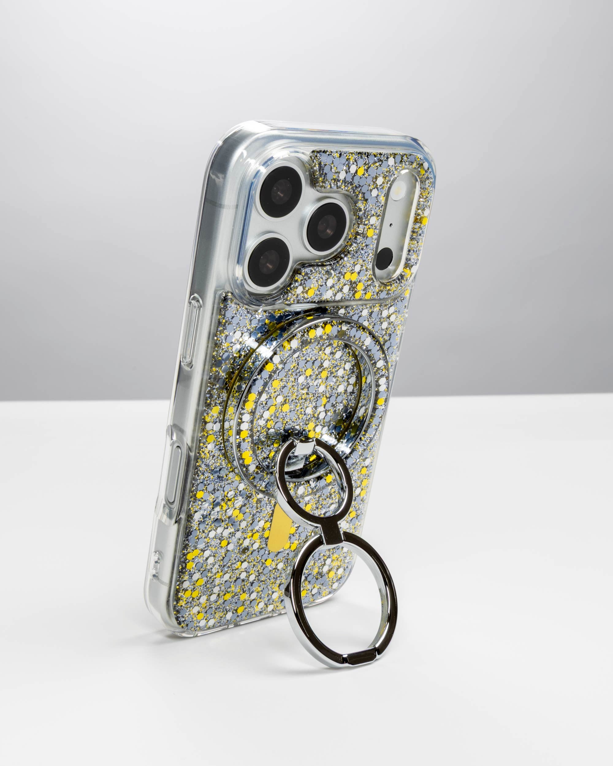 Starlight Sparkle Ring Stand, silver-tone, holding an iPhone upright as a stand