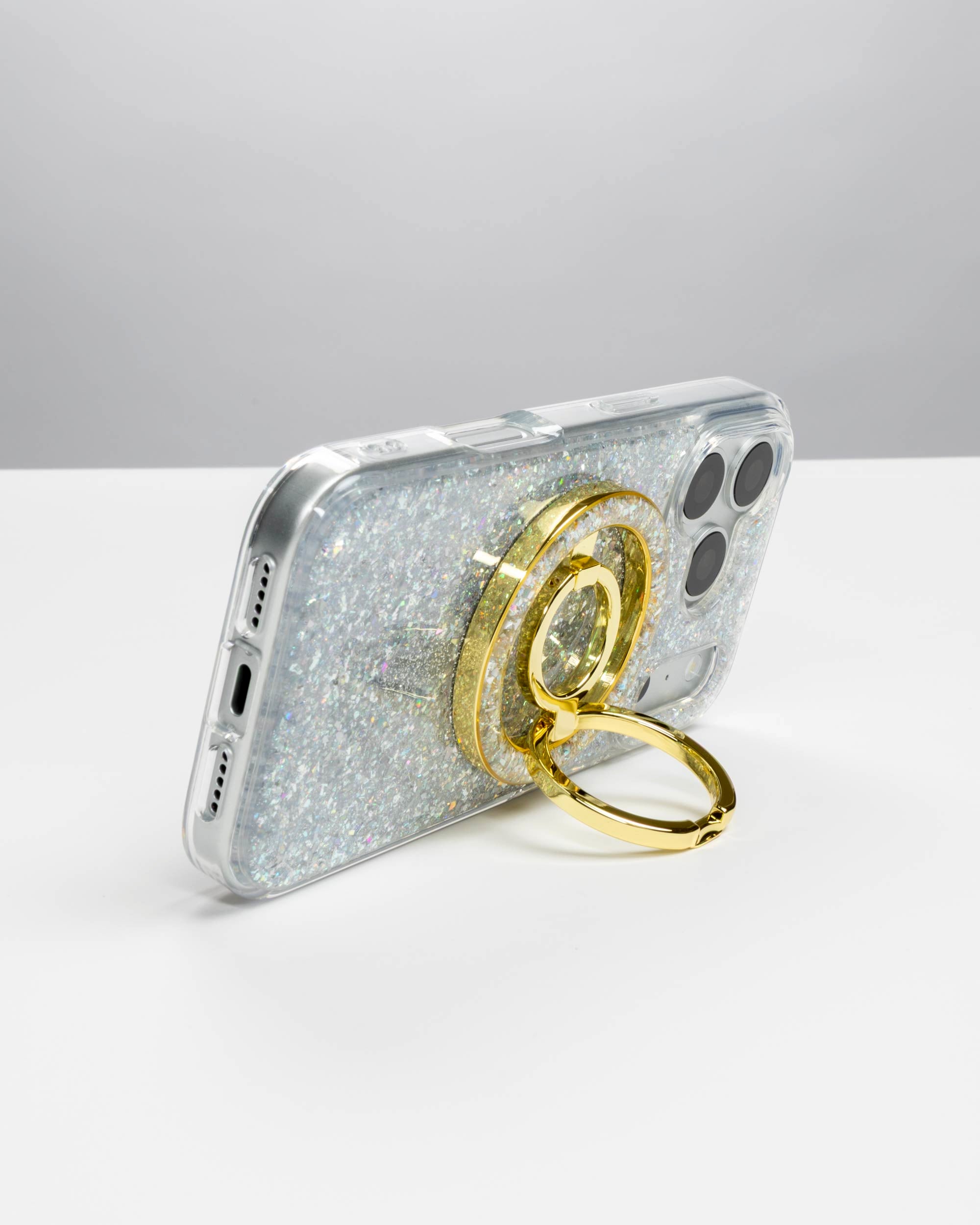 Silver Sparkle Ring Stand, gold-tone, holding an iPhone in landscape as a stand