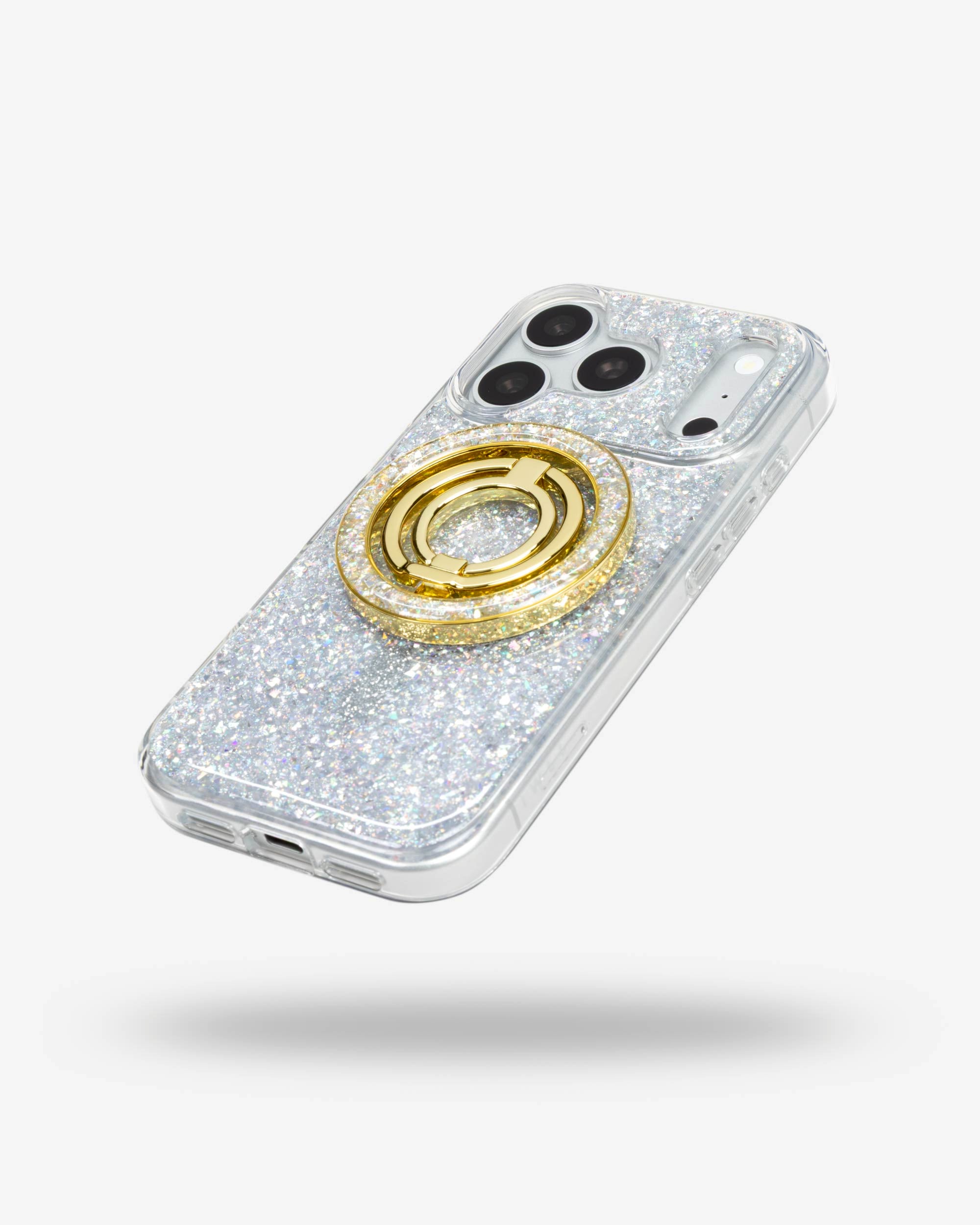 Silver Sparkle Ring Stand, gold-tone, folded flat on the back of an iPhone case